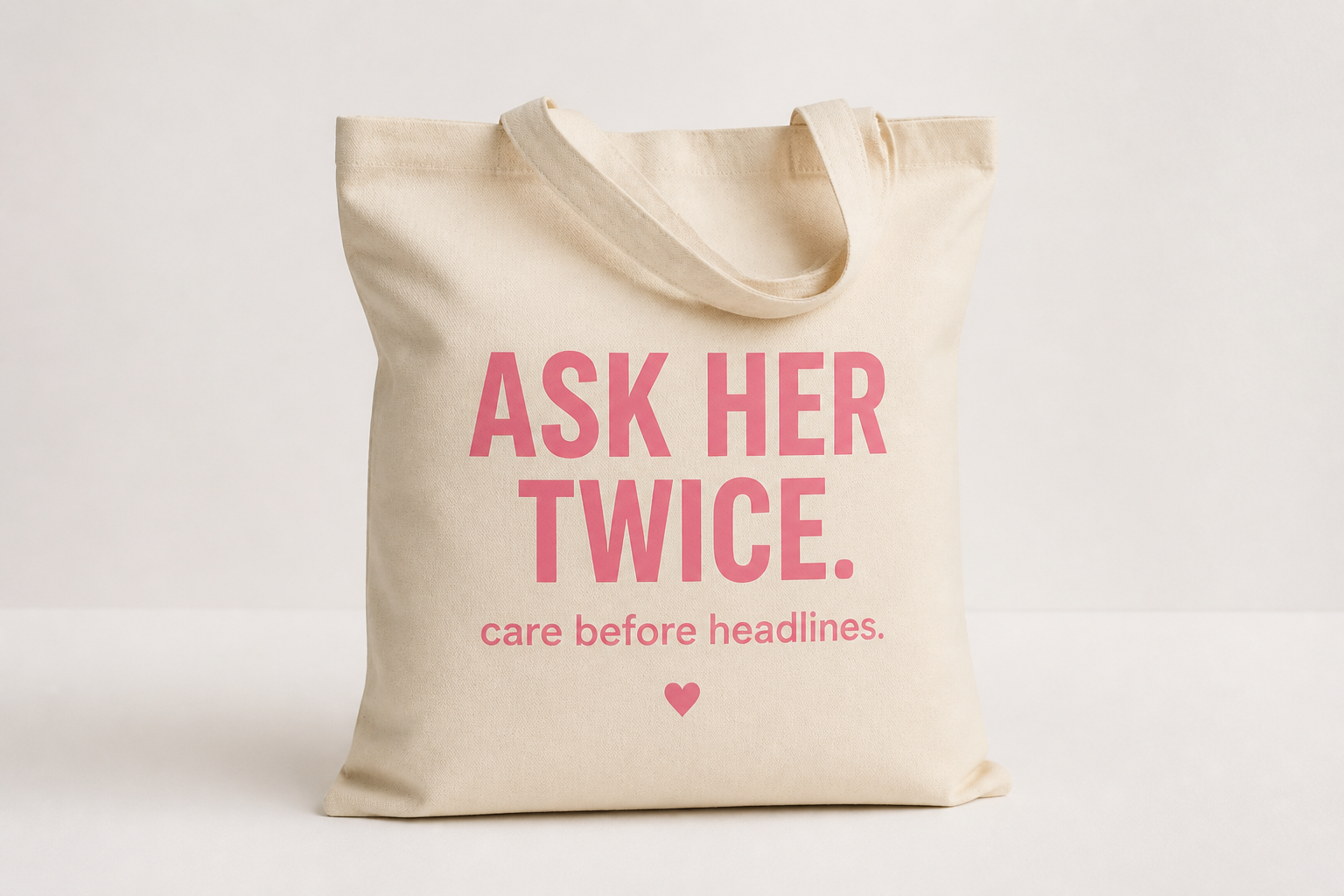 Canvas tote with pink ASK HER TWICE print